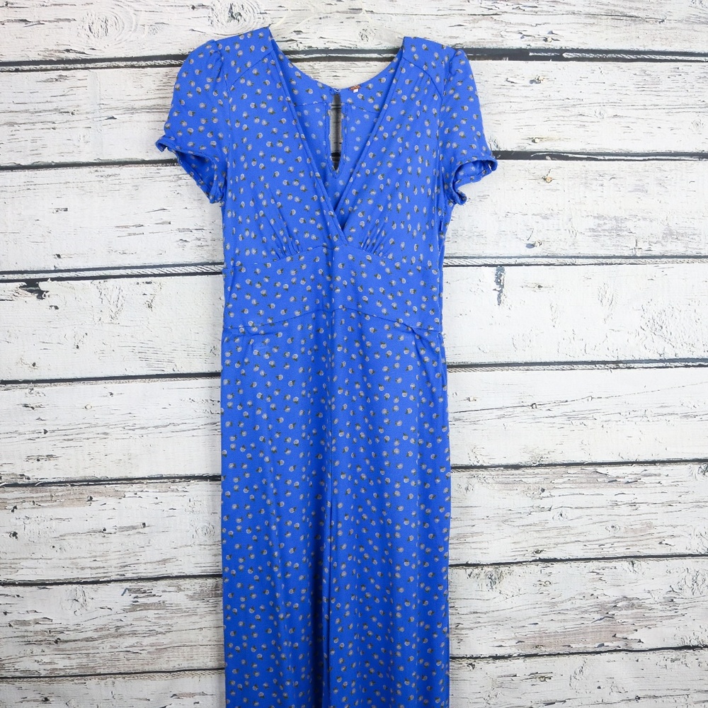 Free People boho blue jumpsuit v neck with oranges